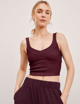 red cropped ribbed tank top with a soft v neckline.
