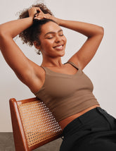 brown ribbed cropped tank with front and back v necklines.