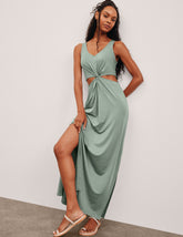 green v-neck maxi length tank dress with cutouts at the waist.