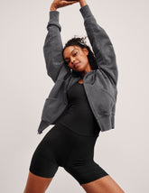 black zip-up hoodie jacket with pockets.