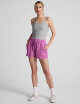 pink shorts with patch pockets and a drawstring at waistband.
