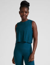 blue relaxed fit cropped tank top with a crew neckline.