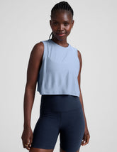 blue relaxed fit cropped tank top with a crew neckline.