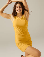 yellow tank top mini dress with ruching on the sides.
