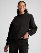 black crew neck sweatshirt.