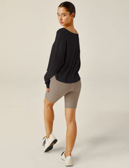 black wide scoop neck long sleeve sweater.