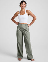 green mid-rise trouser pants with pockets.