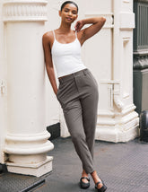 gray trouser style pant with a tapered ankle and pockets.