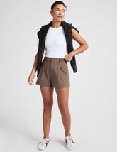 brown shorts with front pleats and side pockets.