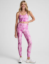 pink and white ice dye print high-waisted midi length leggings.
