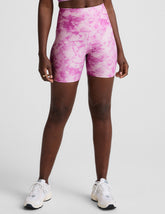 pink and white ice dye print high-waisted biker shorts.