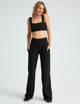 black high-waisted 29" inseam pants with pockets.