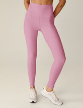 pink high-waisted midi leggings.