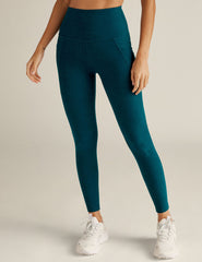blue high-waisted midi spacedye leggings with side pockets.