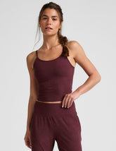 red waist length spaghetti strap tank.