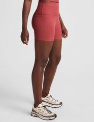 red high-waisted, 3" inseam biker shorts.