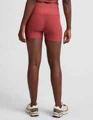 red high-waisted, 3" inseam biker shorts.