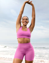 pink high-waisted 5" length biker shorts.