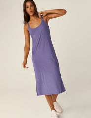 purple scoop neck midi dress with front side slit on each side.