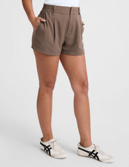 brown shorts with front pleats and side pockets.