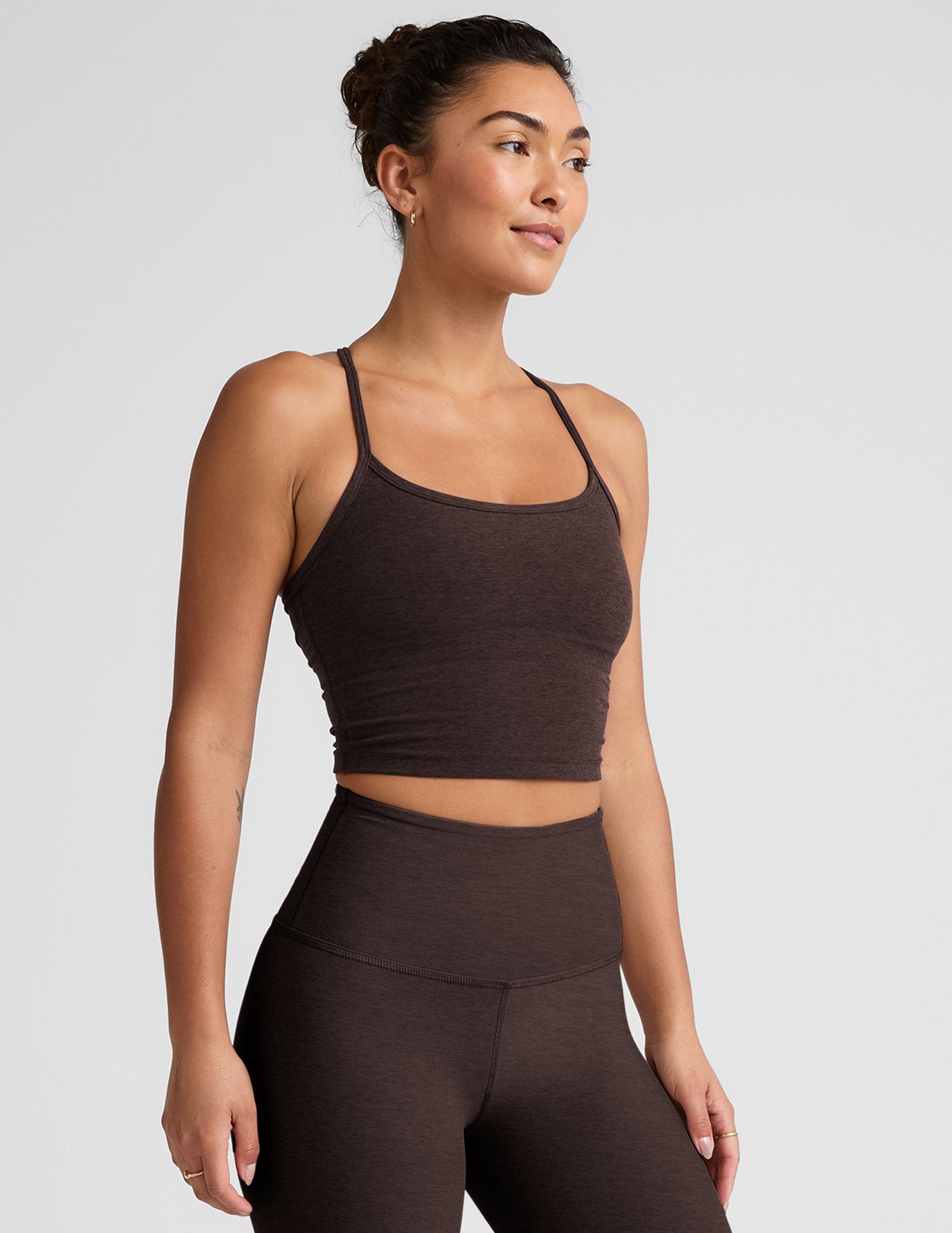brown racerback cropped tank with slim straps.