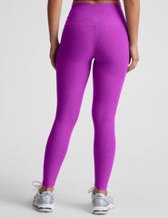 purple high-waisted midi length leggings.