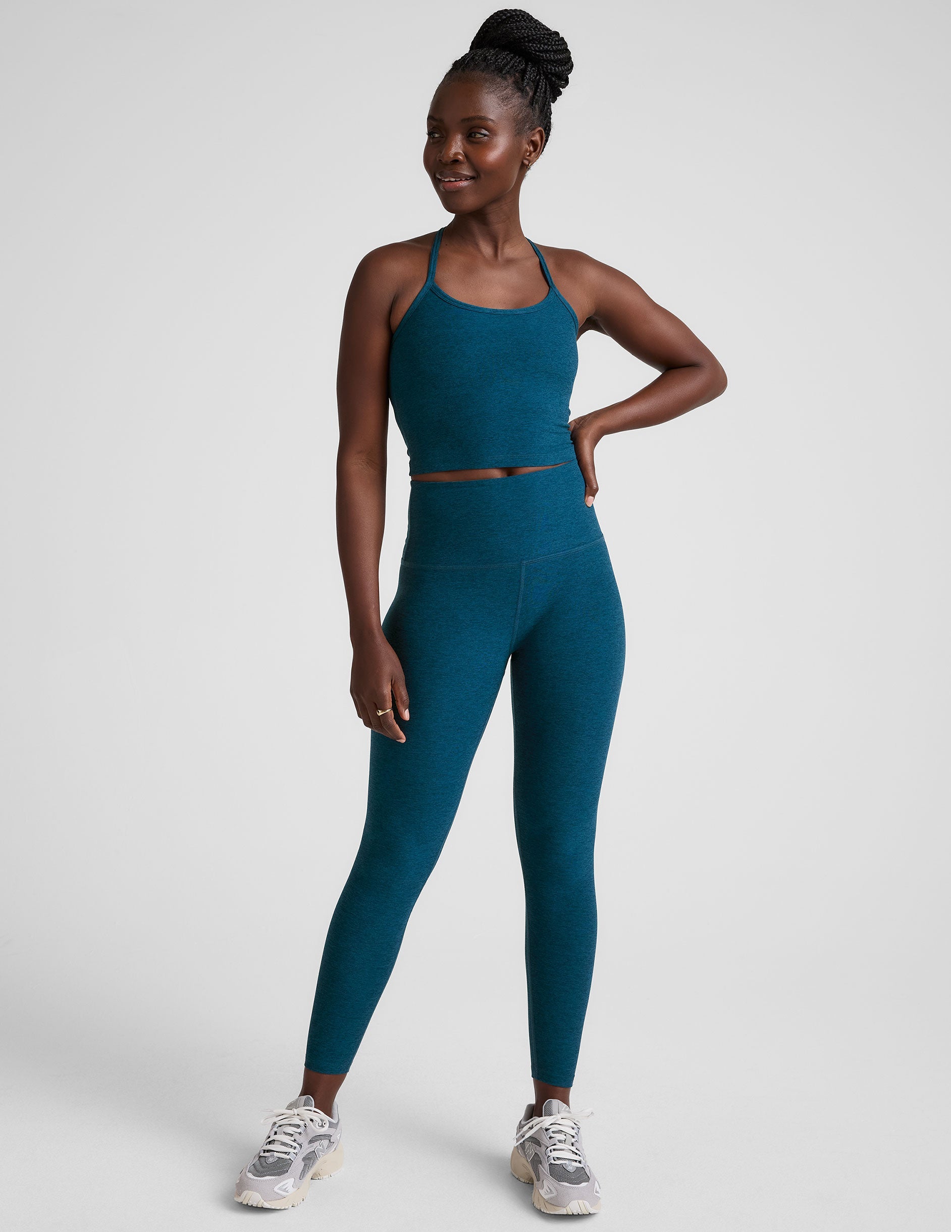 blue racerback cropped tank top with slim straps.