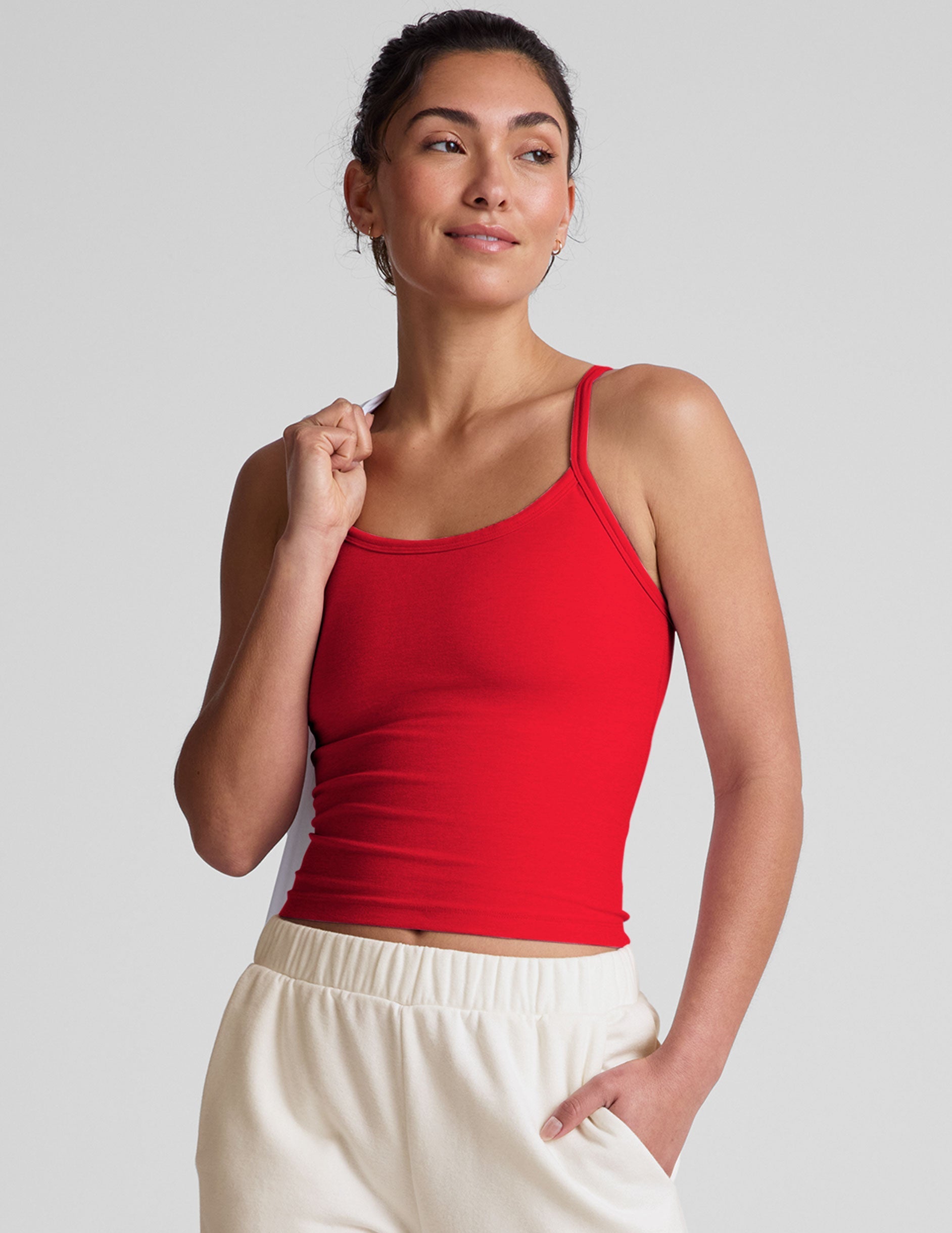 red waist length slim strapped racerback tank.