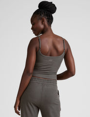 gray waist length tank with adjustable spaghetti straps.