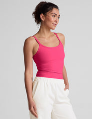 pink waist length tank top with adjustable straps.
