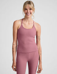 pink waist length racerback tank with slim straps.