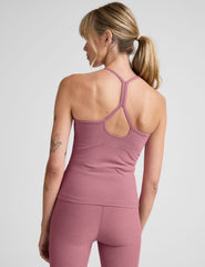 pink waist length racerback tank with slim straps.