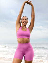 pink high-waisted 5" length biker shorts.