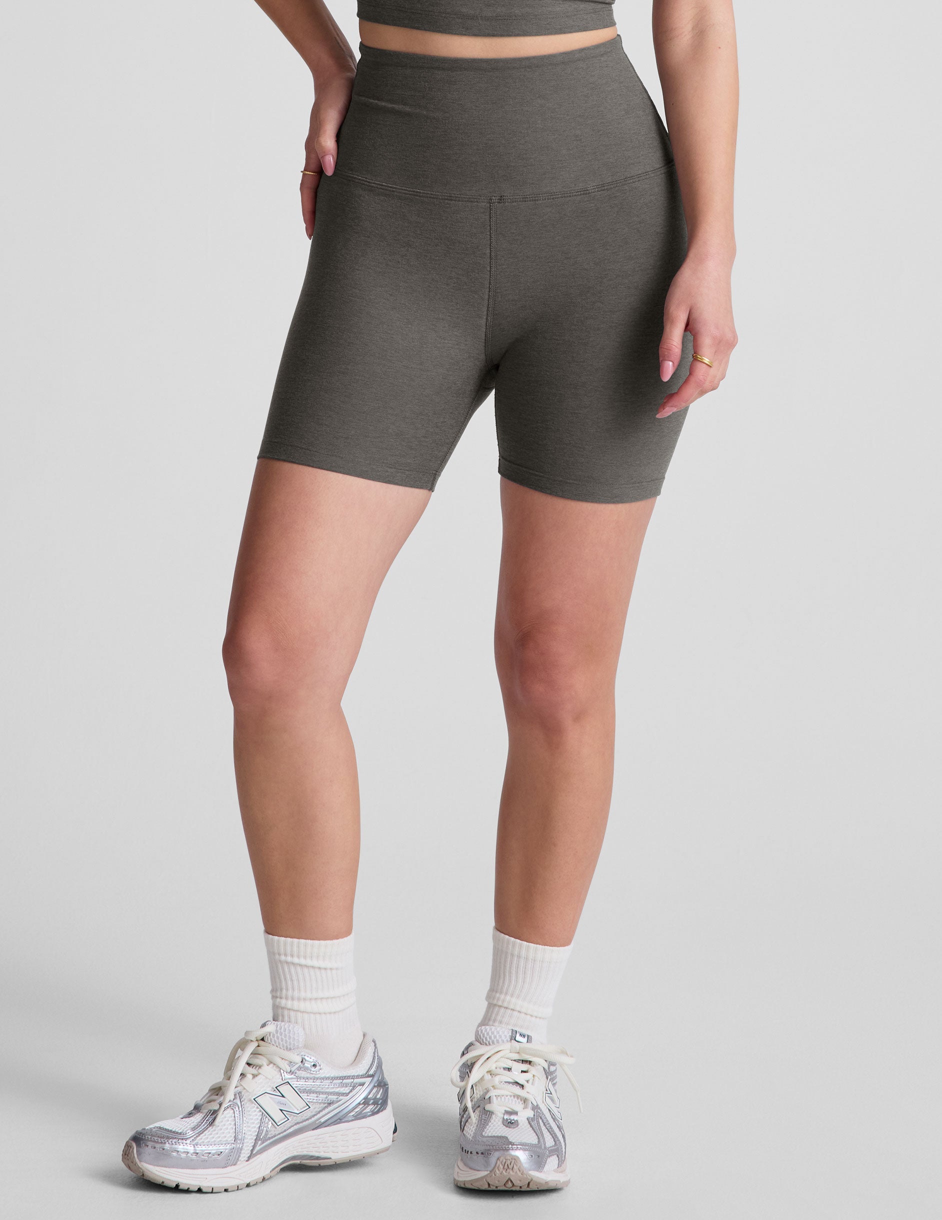 gray high-waisted biker shorts with a 5" inseam. 