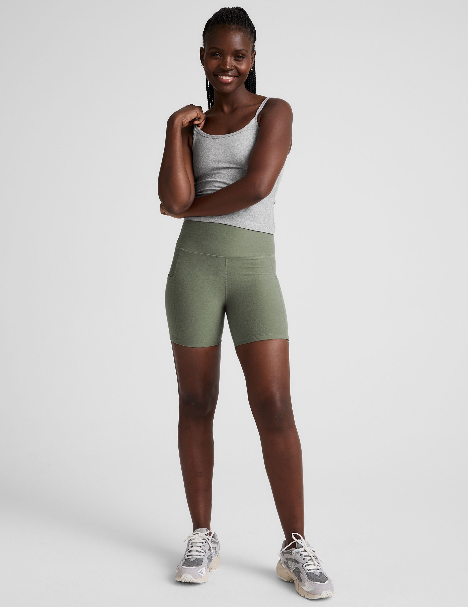 green high-waisted 5" inseam biker shorts  with pockets. 