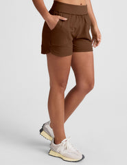 brown 3" inseam shorts with side pockets. 
