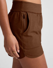 brown 3" inseam shorts with side pockets. 