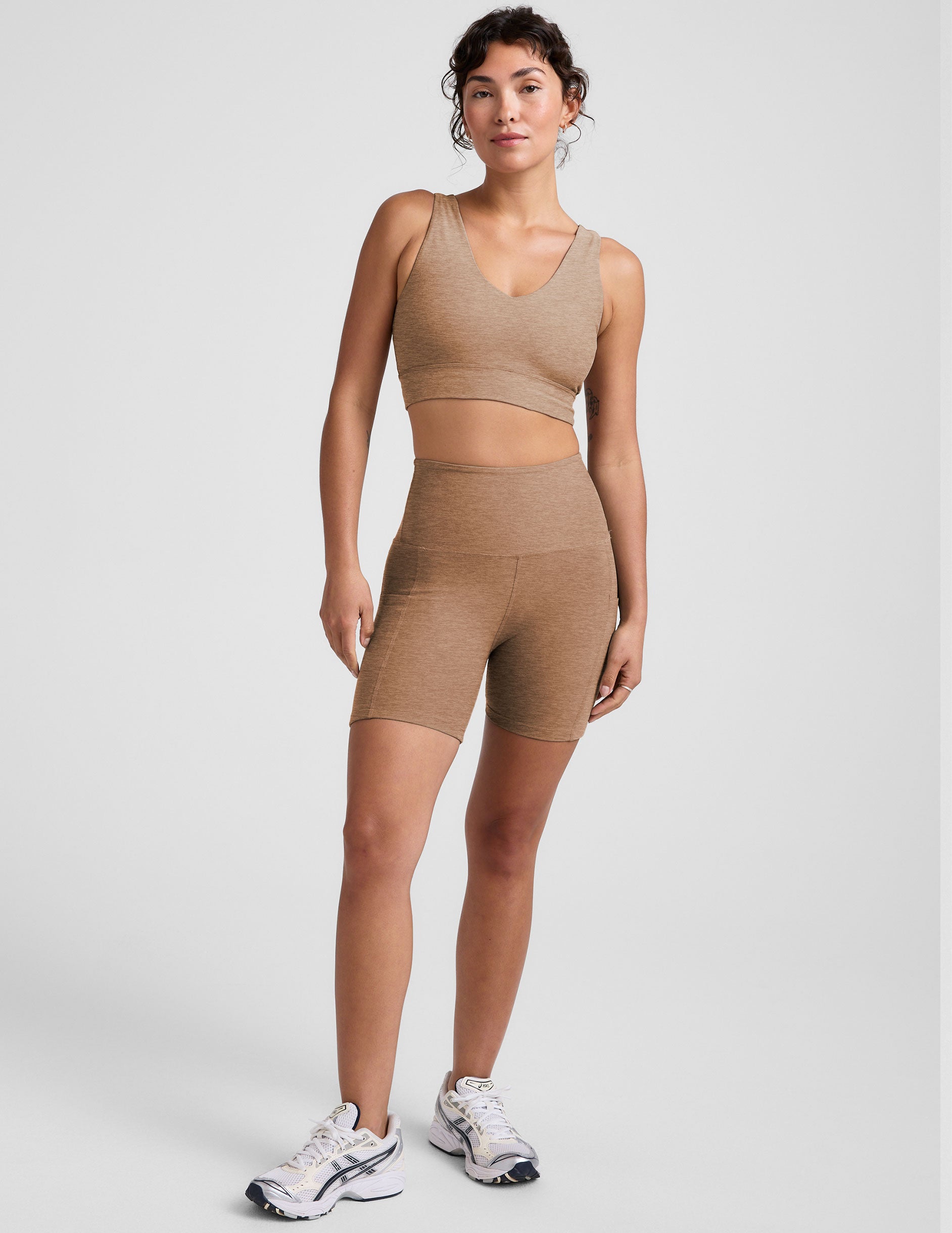 brown long line style bra with a front and back v-neck.