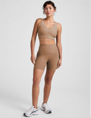 brown long line style bra with a front and back v-neck.