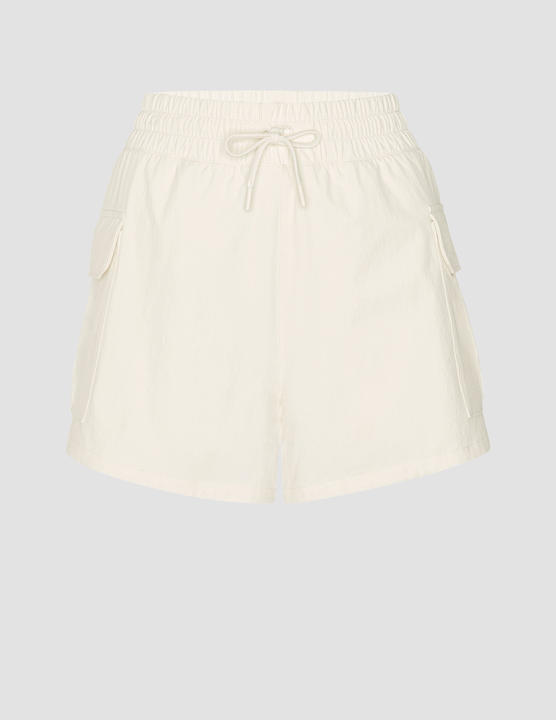 white mid-rise shorts with two side patch cargo pockets and a drawcord at waistband.